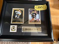 Front view showing cards, pin, nameplate in frame