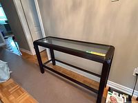 Full view of console table, glass top, wood frame