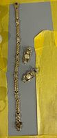 Full view of bracelet and earrings set laid out