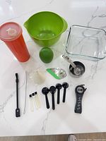 Overall lot showing all utensils, bowl, dish, tumbler, funnel, opener, brushes, lime container