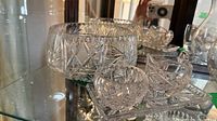 Serveware set displayed in cabinet