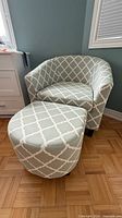 Armchair and ottoman together showing overall style and pattern