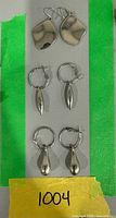 All three pairs laid out vertically on background with tape markers