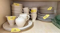 Set stored on shelf showing stacks and quantities