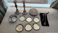 All 14 pieces displayed on table