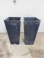 front view of both planters standing side by side
