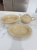 Teapot, bowl and platter group shot