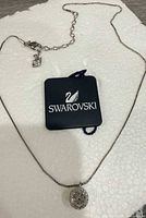 Necklace full view showing chain, lobster clasp, extender and Swarovski tag