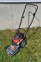 Front left view of Craftsman walk-behind trimmer showing full unit