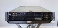 Front view of Dell PowerEdge R710 server showing drive bays, optical drive, LCD panel, and ventilation
