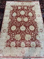 Full view of rug showing entire design and fringe