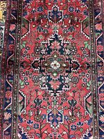 Central area of runner showing single medallion and floral motifs