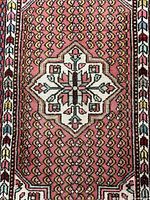 Front view showing full pattern of rug