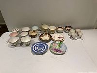 Group shot of all cups, saucers and plates
