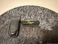 Pocket knife and leather case overview
