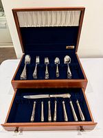 Entire set in open two-tier box showing all utensils