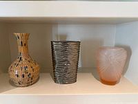 All three vases displayed on shelf