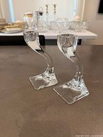 Both Riedel Duetto crystal candlesticks angled view