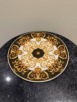 Top view of Rosenthal Versace Barocco plate showing full pattern