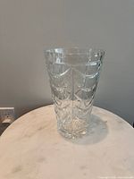 Front view of clear crystal vase showing swag pattern