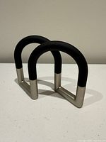 Front angle view showing dual arches and two-tone finish