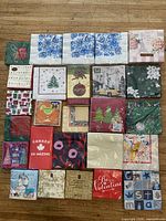 Front view showing 25 sealed napkin packages in five-by-five layout