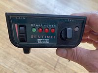 Front view showing Tekonsha Sentinel faceplate, controls and LEDs