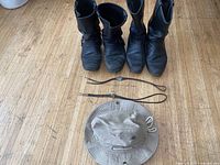 All items overview: two boot pairs, two bolo ties, khaki hat