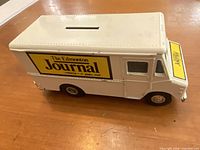 Left side view showing Edmonton Journal decal and overall condition