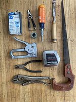 Group shot of all tools arranged on wood surface