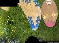 Top view showing both skimboards graphics