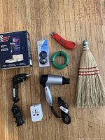 Overview of all eight items on wooden floor