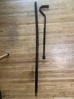 Full view of both walking aids on floor