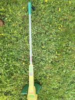 Full view of Weed Eater 1210 trimmer on grass