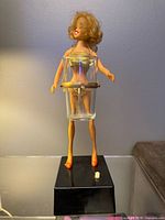 Front view of Go-Go Girl drink mixer with glass and base