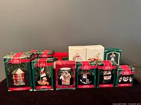 Group shot of all eight boxed ornaments