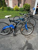 Both bicycles side by side on driveway