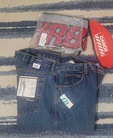 Jeans, protective blanket, welding cap in one frame