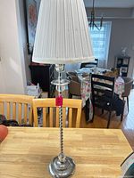 Full lamp with shade on tabletop