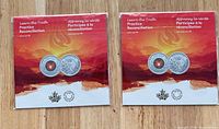 Two sealed Truth and Reconciliation keepsake packages side by side