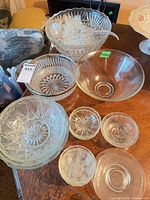 Group view of punch bowl, ladle and assorted bowls