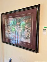 Full view of framed print showing matting and frame