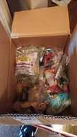 Box of sealed McDonald's promotional toys