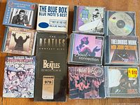 Group of 10 CDs including Beatles, Blue Note box, Quadromania, compilations