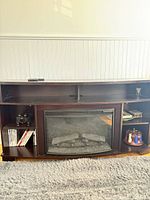 Full front view showing console, fireplace insert, side shelves