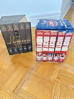 Rocky 1-5 box set and Legends of Hockey box set front view