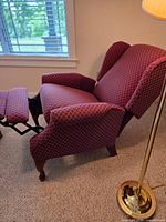 Recliner chair side view with footrest extended