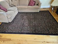 entire rug in living room setting showing overall size and pattern