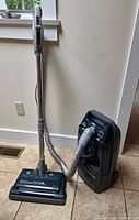 Full view of Kenmore canister vacuum with hose, wand and Power-Mate head attached