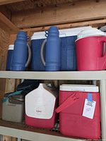 Group view of all coolers on shelving
